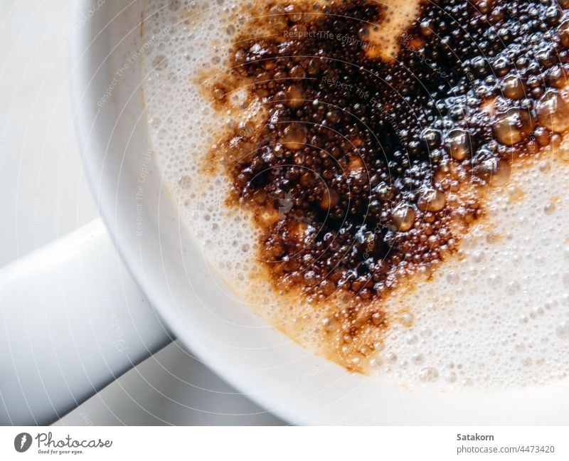 Coffee stains on white coffee cup that have been left in a coffee shop drink caffeine breakfast brown beverage mug tasty view morning empty cafe table