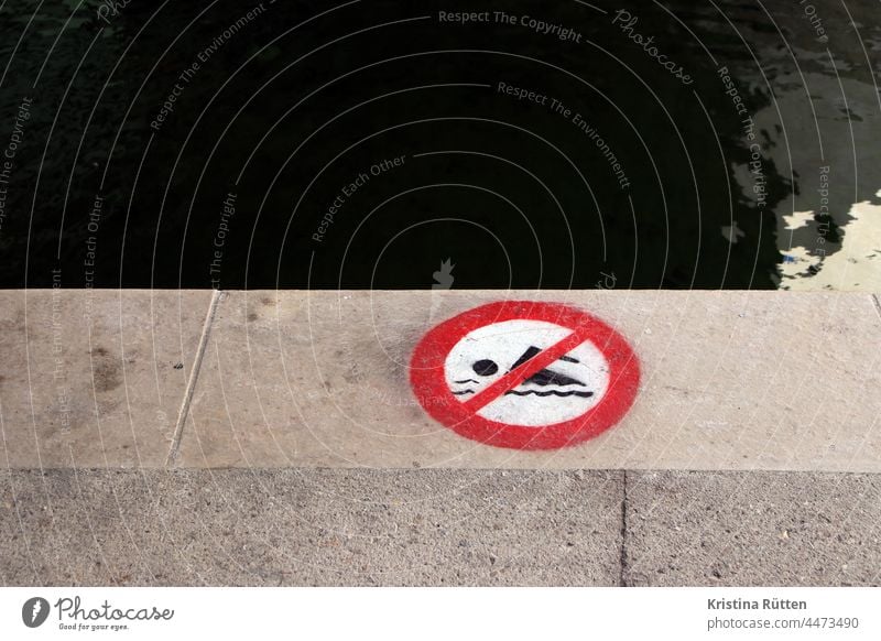 no swimming symbol on the quay wall be afloat forbidden Clue Warn Sign sign bank wharf Harbour Promenade harbour basins Channel Water Body of water peril