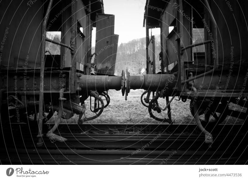 decommissioned abandoned wagons rusting away Railroad car Railroad tracks Silhouette wreck ghost train Train lost places Decline Change Ravages of time siding