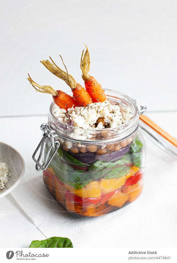 Glass jar with tasty salad vegetable bulgur bell pepper carrot serve meal food culinary cereal delicious raw fresh nutrition healthy organic colorful ripe