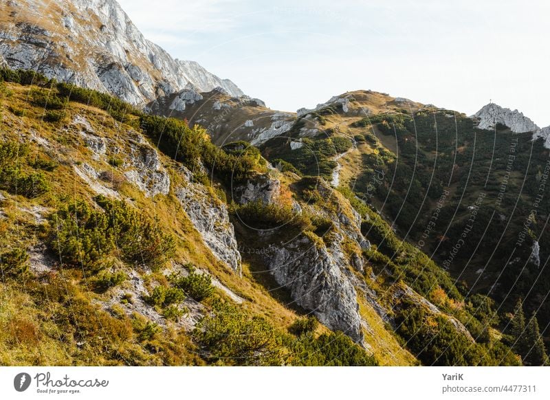 mountain hiking hiking trail hiking route hike Hiking path Forwards Upward mountains Peak Peak cross Stony Autumn Autumnal Bavaria Berchtesgaden Alpes