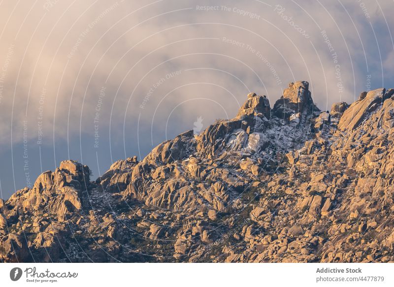 Rocky mountains with clouds morning rock nature terrain highland rough early landscape geology madrid spain sierra de guadarrama national park countryside