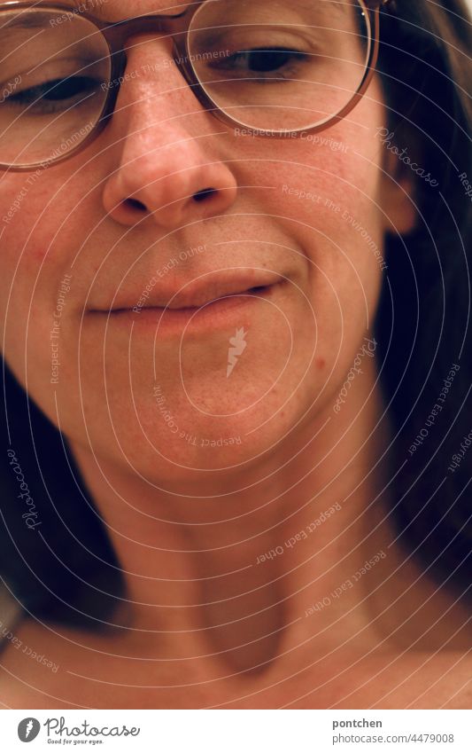 a woman with glasses directs her gaze sceptically downwards skepticism Looking Woman Eyeglasses look Face critical Neck thoughts