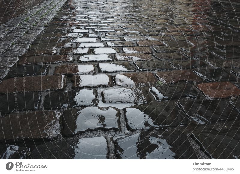 Sometimes it rains... Street Rain Cobblestones Wet Town Paving stone Exterior shot Reflection Bad weather Deserted Damp Glittering Traffic infrastructure Stone