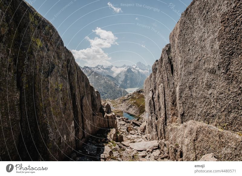 Grimsel Pass, Nature, Switzerland Hiking Tourism Alps hike Beautiful weather Summer Blue sky Mountain Rock mountain lake Trip Vacation & Travel