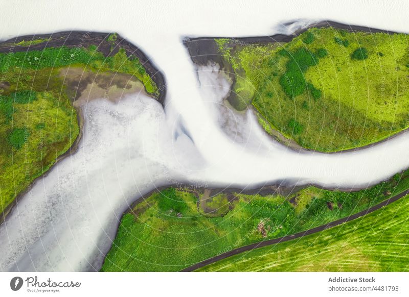 Mountainous terrain amidst grass in nature rock mountain forest vegetation abstract background fog altitude formation high vegetate rough iceland scenic mist