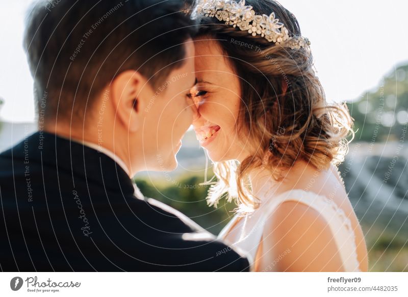 Portrait of a just married couple on an accomplice smile wedding husband wife love copy space crown portrait happy heterosexual bride groom forest tree sunset