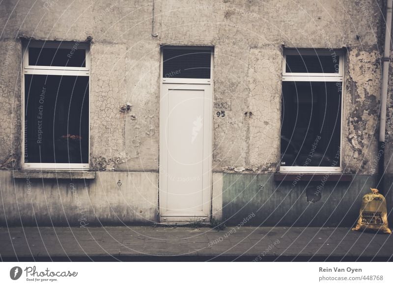 Dirty facade Village Small Town House (Residential Structure) Wall (barrier) Wall (building) Facade Window Door Bell Old Dark Gray Subdued colour Exterior shot