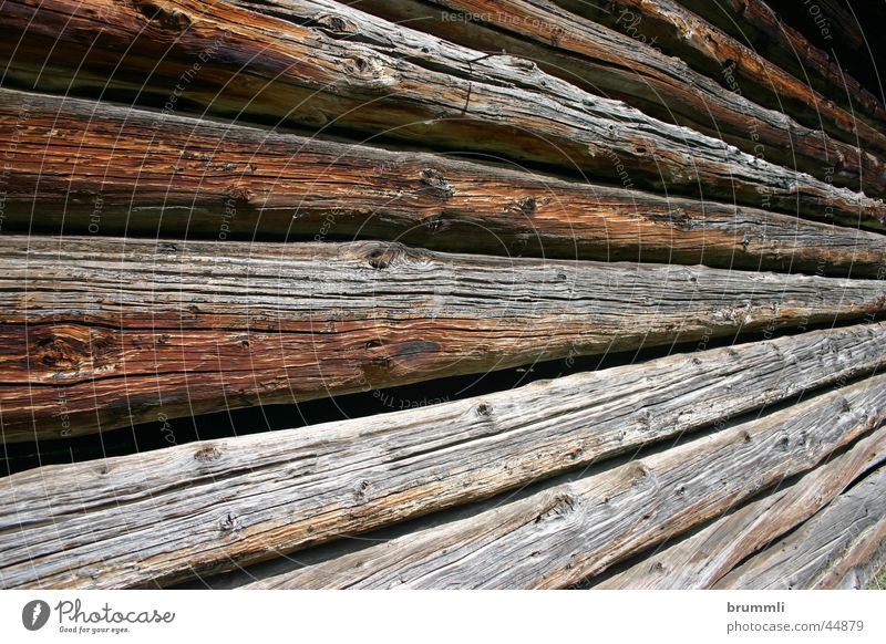 Alpine farming I Wood Wooden house Alpine pasture Barn Hayrick Dolomites Rejuvenate Brown Joist Derelict Mountain Alps Hut River Wooden wall Central perspective