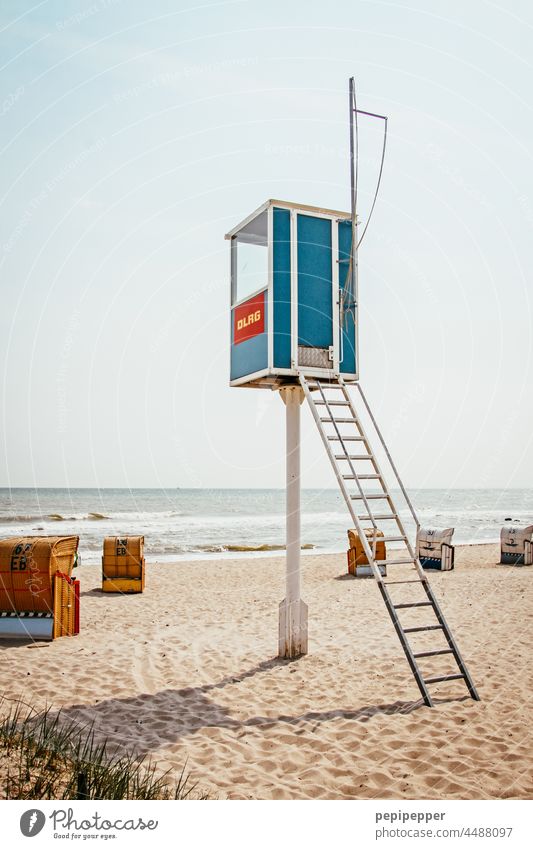 DLRG house on the beach with beach chairs dlg Water Summer Swimming & Bathing Beach Ocean Vacation & Travel Rescue Lifeguard Life belt Summer vacation Drown