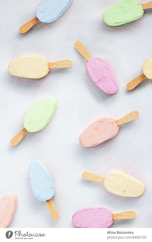 Bright and colorful flat lay of Popsicle ice cream set on white background. Healthy summer food concept. Top view of popsicle, overhead dessert sweet cold fruit