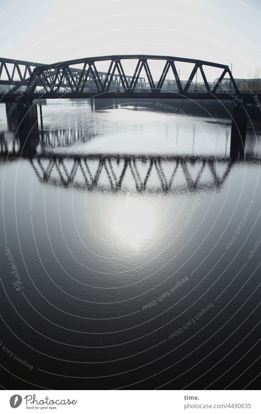 Traffic conditions Bridge Railway bridge Water Elbe Back-light Dazzle Sun sunny reflection Shadow Protection Safety Horizon cheap port brandshofer lock bridge