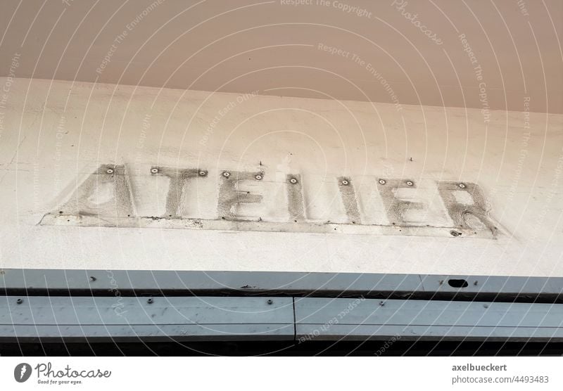 Atelier sign dismantled after business closure Store premises Load business discontinuation broke Artist Shadow dismounted Closed Crisis Insolvency