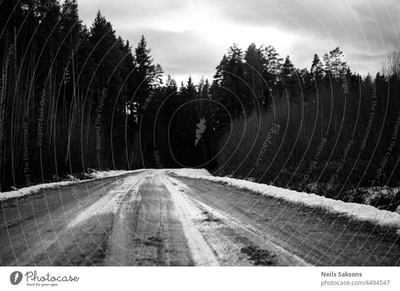 muddy spring road in forest outdoors snow ice background city climate season car water type of transport deep house texture nature winter white safety weather