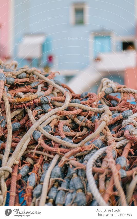 Heap of ropes places on street heap structure colorful element district building residential fishing house detail exterior construction daylight city bright