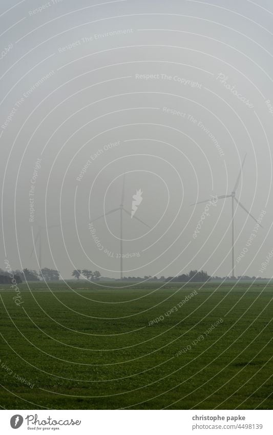 Windmills in the fog Pinwheel Energy industry stream Renewable energy wind power Wind energy plant eco-power Eco-friendly Fog Ecological Electricity