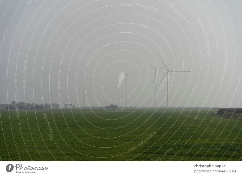 Windmills in the fog Pinwheel Energy industry stream Renewable energy wind power Wind energy plant eco-power Eco-friendly Fog Ecological Electricity