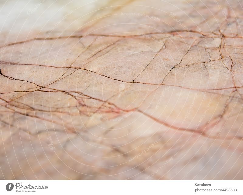 Cracks on the surface of the marble countertop tabletop cracked textured wallpaper material stone rough detail damaged covering floor elegance rock blank