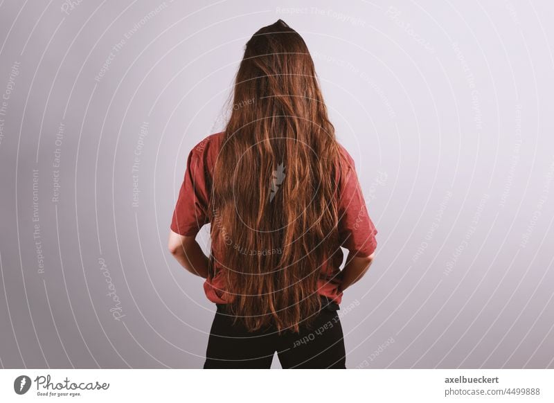 Brunette woman with very long hair down to her butt long hairs Hair and hairstyles Long-haired lengthy Woman Rear view Unrecognizable Feminine Young woman