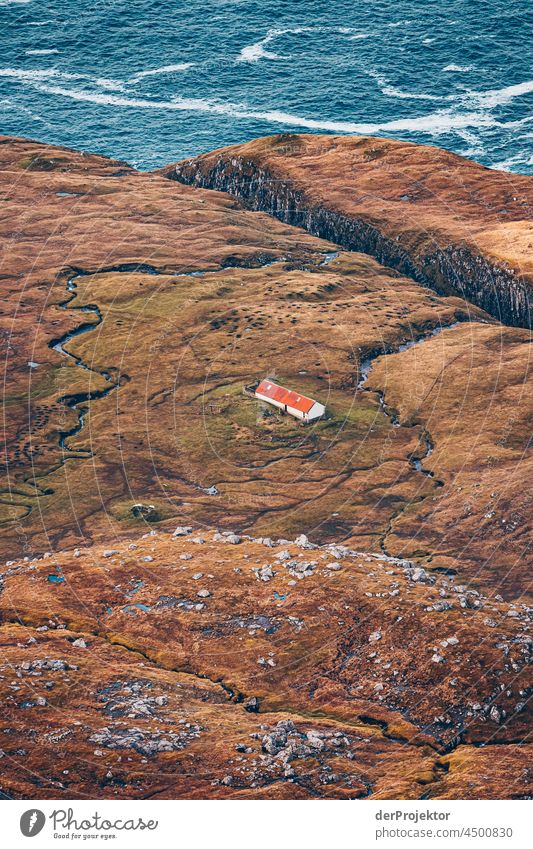 Lonely farm on the Faroe Islands traditionally Outdoors spectacular rocky naturally harmony Weather Rock Hill Environment Rural highlands Picturesque Landscape