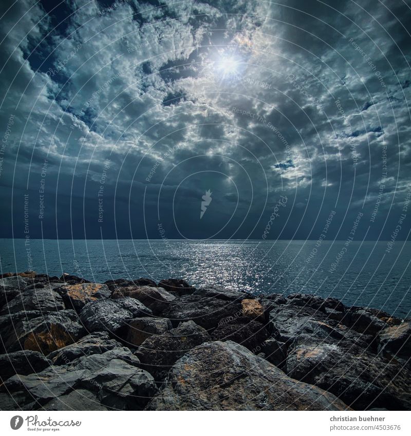 mystical sky sea and stone composition - day for night Ocean Beach stones Clouds Sun Mystic Night Blue deep blue Noble Nature magic Dream landscape refreshingly