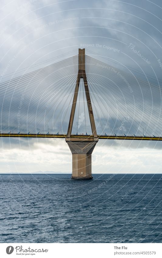 Rio Andirrio Bridge Patras - Greece Gulf of Corinth Mediterranean sea cloudy sky Gray Ocean Deserted Water Copy Space top Bridge pier Peloponnese rainy Concrete