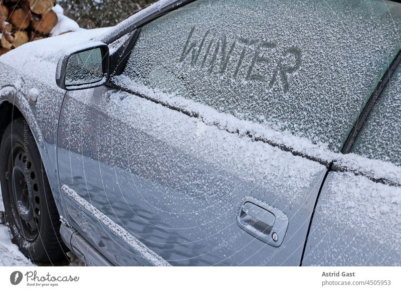 Winter on the road. A car full of snow and ice Car Vehicle Snow Ice Street Road traffic snow into Frost Cold chill icily Frozen quick-frozen Driving Transport