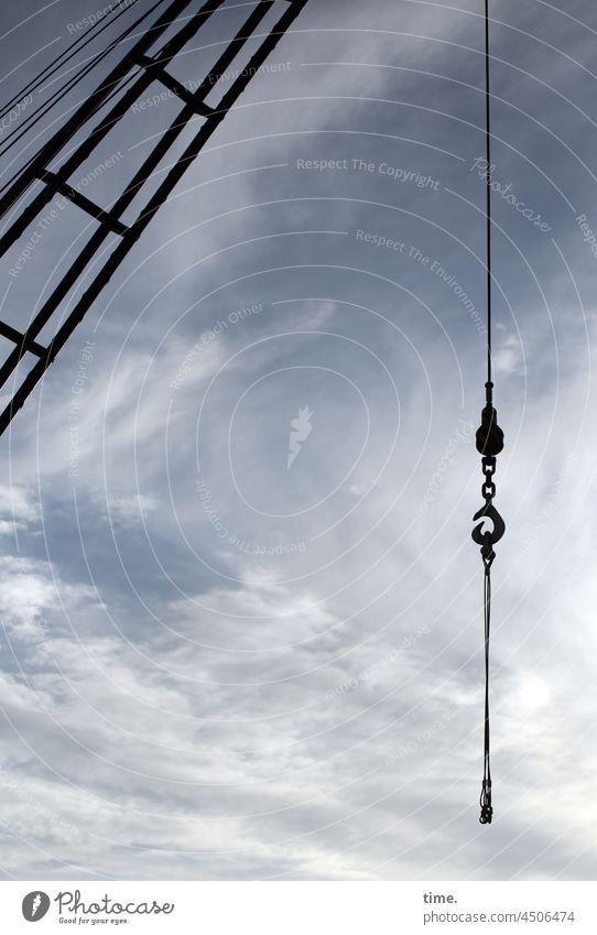 Feierabend - Crane with rope, hook and chain in front of cloudy evening sky Rope Checkmark Chain Clouds Tall Steel Iron Hang inert Diagonal perpendicular aids