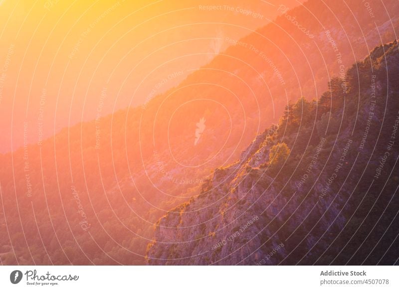 Stony slope in sunny weather mountain rock cliff highland range nature sunlit evening colorful pyrenees spain rough formation environment scenery ridge rocky