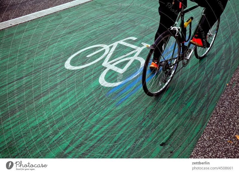 Bicycle on the bike path Turn off Asphalt Corner Lane markings Cycle path Main street Clue edge Curve Line navi Navigation Orientation Wheel cyclists cycle path