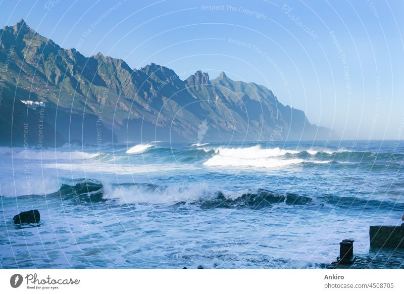 The stormy Atlantic Ocean at Playa del Roque de las Bodegas in Tenerife, Spain ocean water waves atlantic beach spray foam surf sea rocks stones tenerife spain