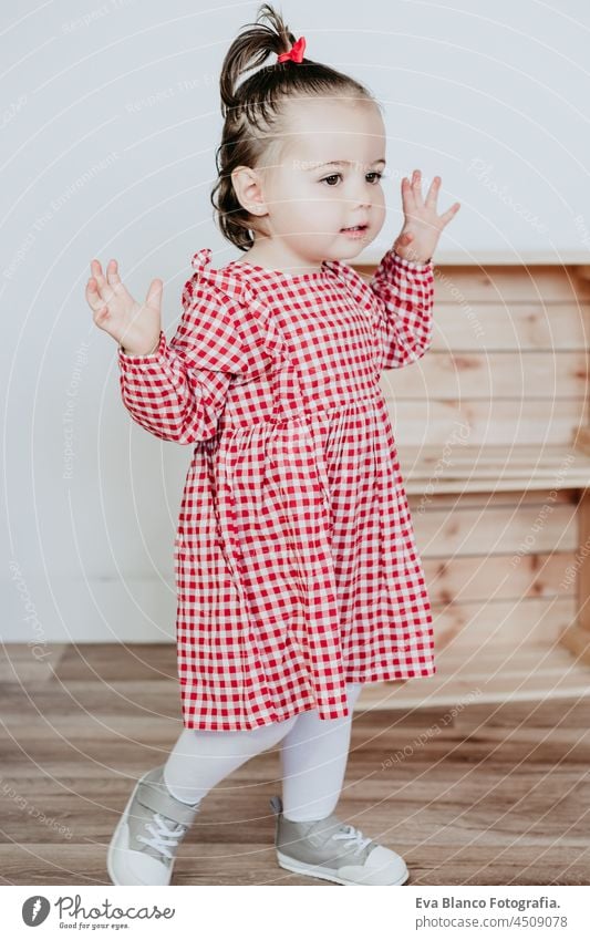 beautiful one year old caucasian girl at home with Halloween decoration, Lifestyle indoors. Halloween party concept. halloween costume happy studio gorgeous 1