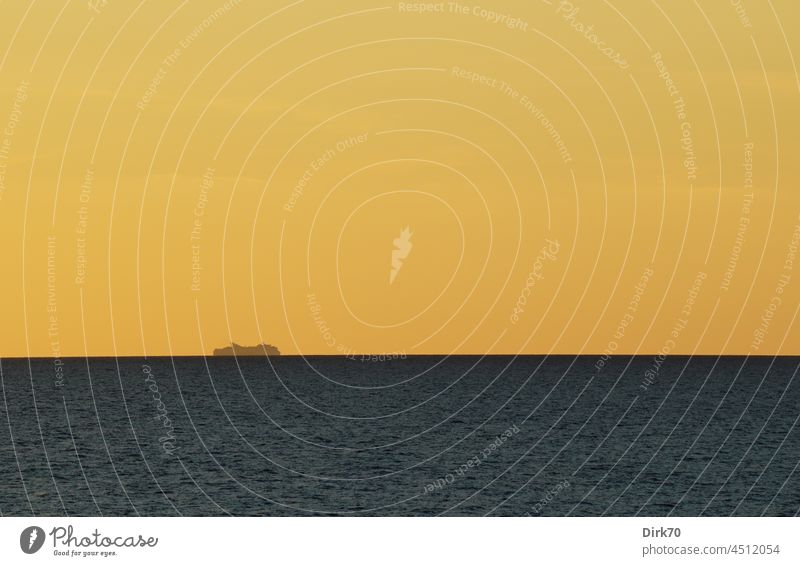 Ferry on the horizon in the evening light Horizon Horizon above the water Twilight Dusk Sunset Silhouette ship Navigation Water Sky Ocean Evening Exterior shot