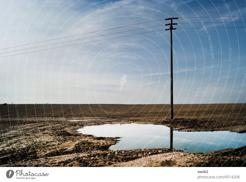 draft Electricity pylon Loneliness High voltage power line Boredom Badlands Deserted Colour photo Sky Landscape Nature Environment Horizon Panorama (View)