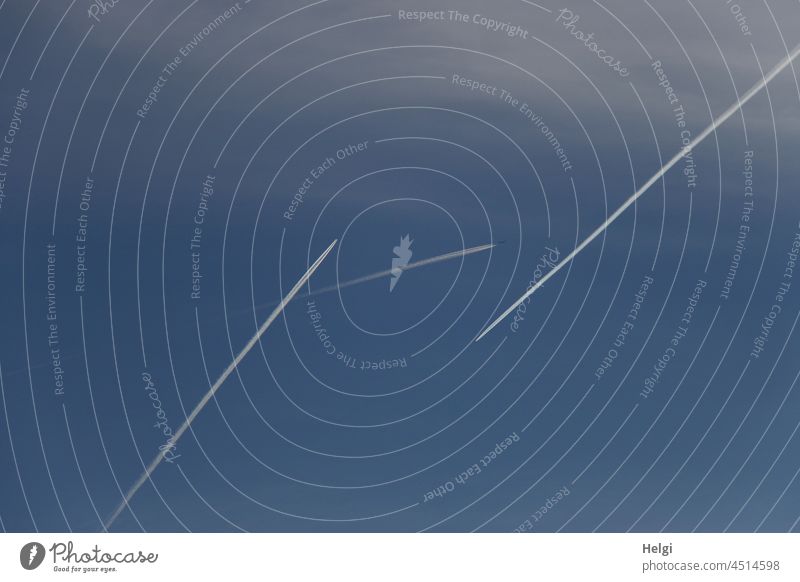 Encounters - three airplanes with contrails against blue sky Airplane Tracks Vapor trail encounter Pattern structure Sky Beautiful weather Blue White aviator