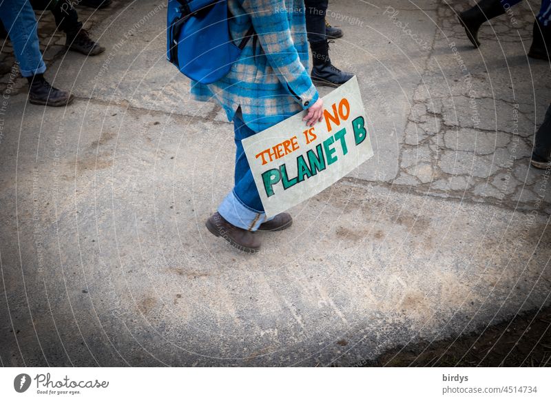 Demonstrator with sign "There is NO Planet B". There is no second planet earth. Climate protection demo Demonstration Climate change demonstranted coal exit