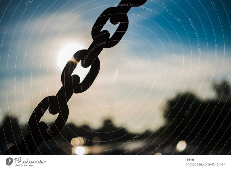 Tension chain of an old bridge Chain Metal Chain link Old Steel Bridge Drawbridge Sunlight Back-light Rust Attachment Connectedness Iron Strong Connection Force