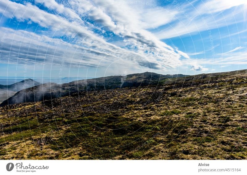 2021_08_10_snaefellsnes landscape and clouds 1 nature dawn field grass sky gravel evening mood outdoor lava stones cloudy water view hill sunset volcanic