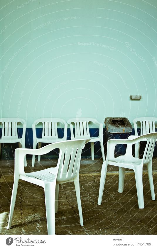 smoking corner Relaxation Calm Gloomy Chair Plastic chair Smoking Trash container Adhesive plaster Turquoise Empty Deserted Loneliness Row of chairs