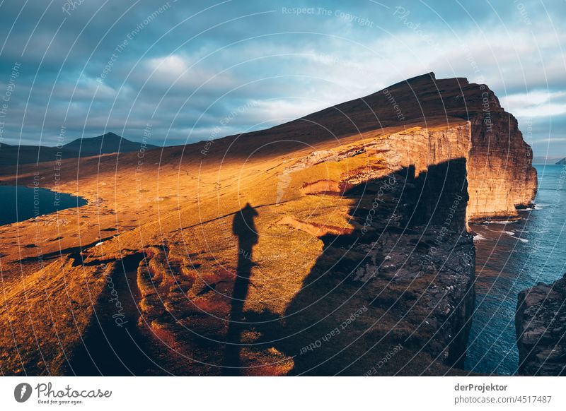 Rocks of Bøsdalafossur in the sunset on the Faroe Islands Surf curt Slope Territory Sun Dismissive cold season Denmark Experiencing nature Adventure Majestic