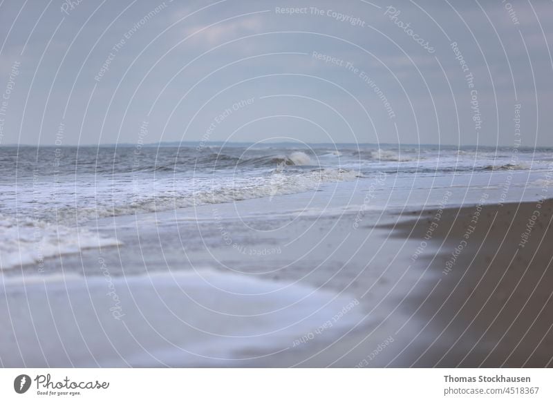 Waves of the North Sea on the beach autumn background beach scene beautiful blue cloud coast coastline colour copy space environment horizon landscape morning