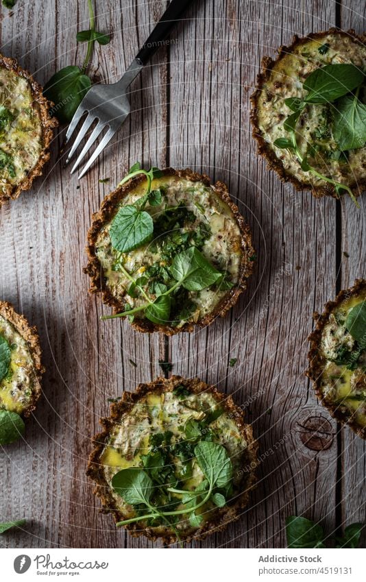 Vegetarian cauliflower pies on wooden table cake walnut healthy vegetarian fork homemade greens vitamin tasty nutrition cutlery vegan delicious food culinary