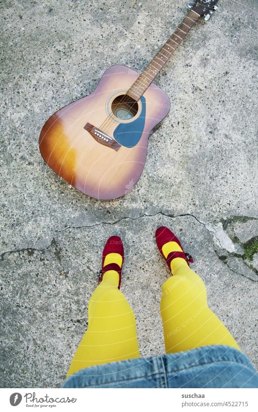 guitar in gape and legs in yellow pantyhose Guitar Musical instrument Sound Note Musician stringed instrument Make music Wood strings acoustics Tone hobby