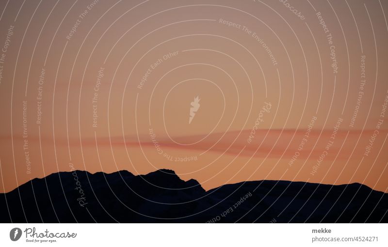 Dawn in the mountains decorated with a delicate cloud Twilight Morning Sunrise colored dawn Mountain Mountain summits Silhouette pastel Paste colours