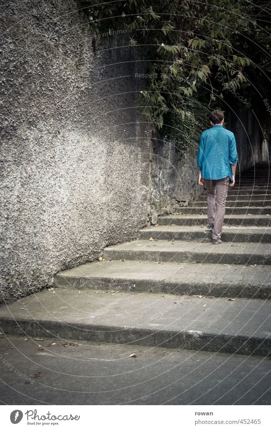 upstairs Human being Masculine Young man Youth (Young adults) Man Adults 1 Wall (barrier) Wall (building) Stairs Dark Cold Broken Gloomy Town Blue