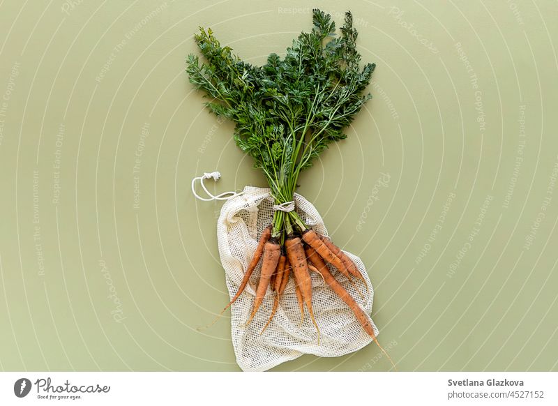 Food from above top view Eco-friendly farm products organic vegetables in mesh bags Flat lay fresh Salad beets carrots tomat cucumbers peppers lettuce food