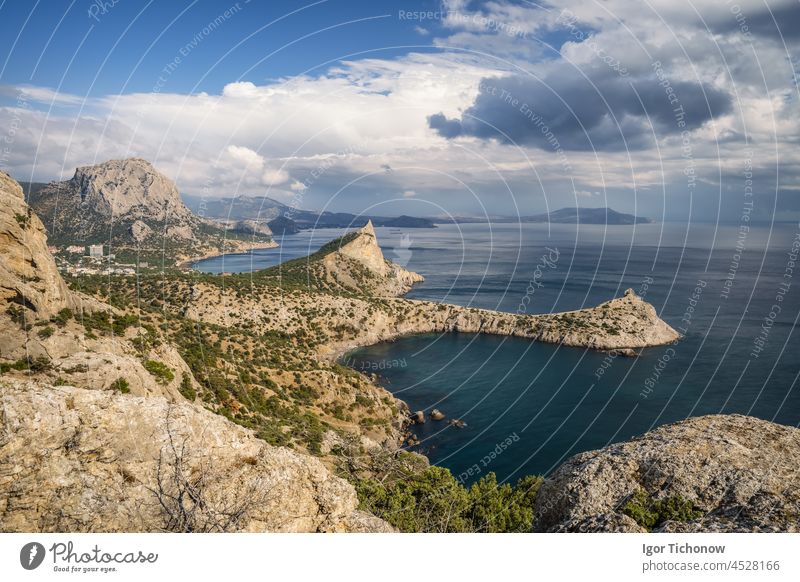 Crimea,Novyi Svit landscape. Cape Kapchik, Mount Falcon suring autumn season with beautiful cloudscape sunset crimea sudak aerial village svit district republic