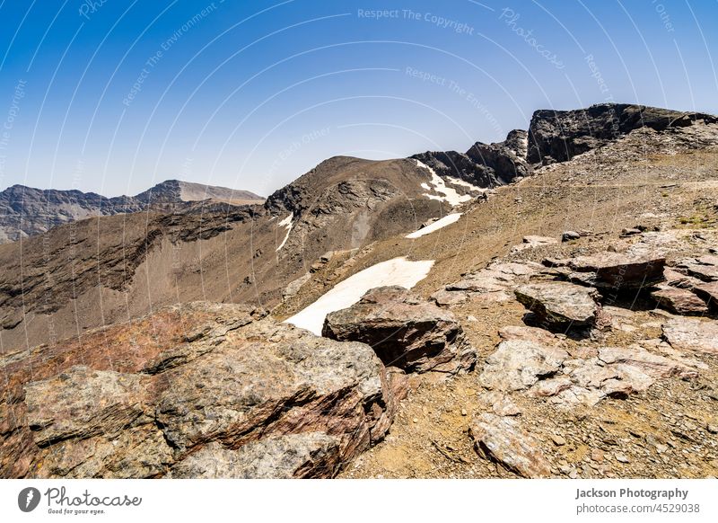 Beautiful landscape of mountains in Sierra Nevada Natural Park, Andalusia, Spain sierra nevada spain national park close up detail copy space blue sky peaks