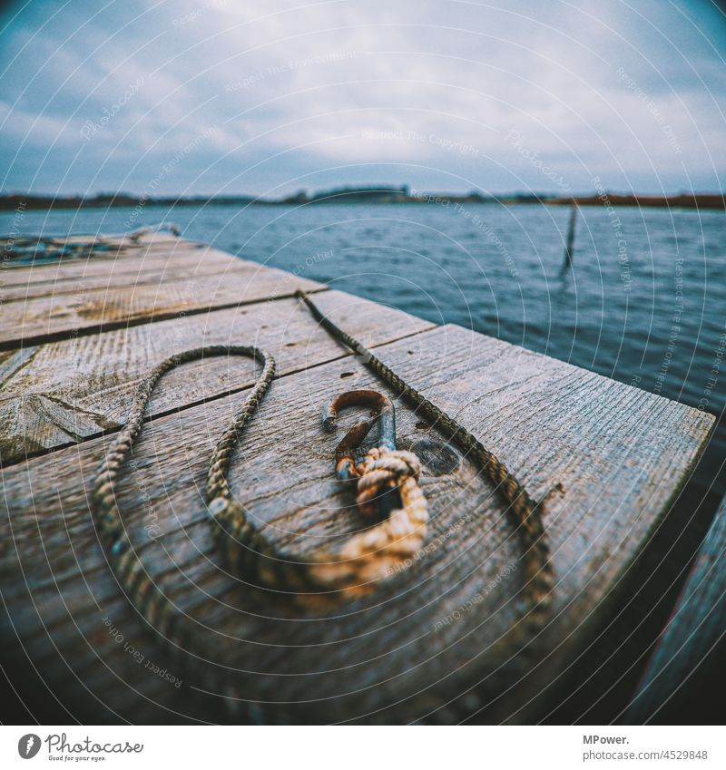 Old rope team jetty Water Lake Rope Checkmark carbine rusty boardwalk Wood investor Jetty Footbridge Harbour Sail coast Maritime