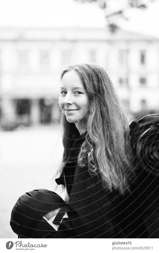 First camping holiday! Portrait of a teenage girl with backpack and sleeping bag portrait Human being Black & white photo Looking Optimism Train station